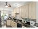 Bright kitchen with dual sink, black appliances and lots of cabinet space at 7881 Mariners Pointe Cir, Denver, NC 28037