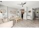 Comfortable living room with contemporary decor, complemented by stylish flooring and lots of open space at 7881 Mariners Pointe Cir, Denver, NC 28037