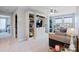 Comfortable living room with built-in shelves, ample lighting, and stylish decor at 8340 Breton Way, Harrisburg, NC 28075
