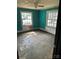 Bedroom with two windows, ready to be renovated at 839 S Chester St, Gastonia, NC 28052