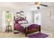 Comfortable bedroom featuring plush carpeting, a ceiling fan, and purple accent decor at 925 Skywatch Ln, Monroe, NC 28112