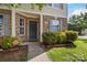 Charming brick home featuring a covered front entrance with well-maintained landscaping at 925 Skywatch Ln, Monroe, NC 28112