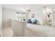 Open loft with comfortable seating and natural light, perfect for a home office or reading nook at 925 Skywatch Ln, Monroe, NC 28112
