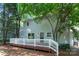 A spacious backyard deck with white railings offers a relaxing outdoor space for entertaining at 9513 Saddle Run Trl, Charlotte, NC 28269
