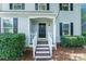 A close-up of the home's front door shows the entrance and surrounding exterior details at 9513 Saddle Run Trl, Charlotte, NC 28269
