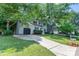 Two-story home with driveway and yard at 9513 Saddle Run Trl, Charlotte, NC 28269