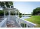 Scenic view of the community pond from a gazebo at 9513 Saddle Run Trl, Charlotte, NC 28269
