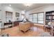 Office with hardwood floors, a large desk, and a window with blinds at 103 3Rd Sw St, Catawba, NC 28609