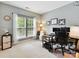 Bright office featuring a large window, work space, and plush carpet at 105 Beech Bluff Dr, Mount Holly, NC 28120