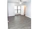 Spacious bedroom with gray walls, window, and a ceiling fan at 11010 Harrowfield Rd, Charlotte, NC 28226