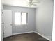 Light-filled bedroom with gray walls, ceiling fan, and a closet at 11010 Harrowfield Rd, Charlotte, NC 28226