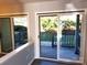 Sliding glass doors leading to a private, covered patio area at 11010 Harrowfield Rd, Charlotte, NC 28226