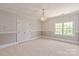 Bedroom featuring a large closet, chandelier, and a large window with natural light at 11723 Oakland Hills Pl, Charlotte, NC 28277