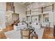 Expansive living room with a second floor balcony, fireplace, and ample seating at 11723 Oakland Hills Pl, Charlotte, NC 28277