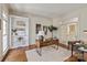 Stylish home office with hardwood floors, built-in shelving, and a modern desk at 11723 Oakland Hills Pl, Charlotte, NC 28277