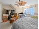 Bedroom featuring ceiling fan, computer desk, and single bed at 11909 Creek Turn Dr, Charlotte, NC 28278