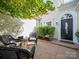 Cozy front porch with a seating area, decorative accents, and a well-maintained front entrance at 11909 Creek Turn Dr, Charlotte, NC 28278
