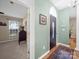 Welcoming foyer with arched doorway and hardwood floors at 11909 Creek Turn Dr, Charlotte, NC 28278