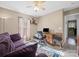 Comfortable office area with sofa, desk, and natural light at 11909 Creek Turn Dr, Charlotte, NC 28278