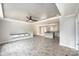 Spacious living room offers modern lighting, wood grain floors and an open floor plan at 122 River Ridge Ln, Hickory, NC 28601