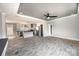 Open-concept living room flows seamlessly into a modern kitchen with stainless steel appliances at 122 River Ridge Ln, Hickory, NC 28601