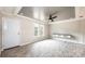 Bright living room featuring tray ceilings, wood grain floors and lots of natural light at 122 River Ridge Ln, Hickory, NC 28601