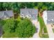 Aerial view of the house showcases its landscaping, roof, and surrounding neighborhood at 12712 Hollyhock Ln, Huntersville, NC 28078