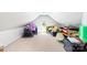Attic featuring storage with a small window at 12712 Hollyhock Ln, Huntersville, NC 28078