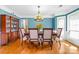 Dining room with wood table and chairs and china cabinet at 12712 Hollyhock Ln, Huntersville, NC 28078