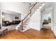 Elegant foyer with staircase and hardwood flooring at 12712 Hollyhock Ln, Huntersville, NC 28078