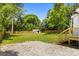 Spacious backyard features a privacy fence, green grass, and storage shed at 1319 Mt Gallant Rd, Rock Hill, SC 29732