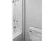 Clean white bathroom featuring a combination shower and tub with updated fixtures at 1319 Mt Gallant Rd, Rock Hill, SC 29732