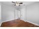 Bedroom featuring hardwood floors, closet space, and neutral walls at 1319 Mt Gallant Rd, Rock Hill, SC 29732