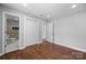 Spacious bedroom with hardwood floors and access to an ensuite bathroom and closet at 1319 Mt Gallant Rd, Rock Hill, SC 29732