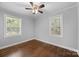 Bright bedroom with hardwood floors and two windows at 1319 Mt Gallant Rd, Rock Hill, SC 29732