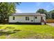 Charming house with white siding, black accents, and a red front door at 1319 Mt Gallant Rd, Rock Hill, SC 29732