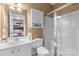 Bathroom featuring a vanity, toilet, glass shower, and medicine cabinet at 1336 Dobson Dr, Waxhaw, NC 28173