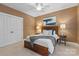 Comfortable bedroom featuring a queen-sized bed, carpet, and a ceiling fan at 1336 Dobson Dr, Waxhaw, NC 28173