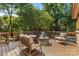 Outdoor deck with wooded views, comfortable seating and a peaceful setting at 1336 Dobson Dr, Waxhaw, NC 28173