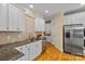 Kitchen featuring stainless appliances, tile backsplash, and granite countertops at 1336 Dobson Dr, Waxhaw, NC 28173