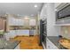 Spacious kitchen with granite countertops, stainless appliances, and ample cabinet space at 1336 Dobson Dr, Waxhaw, NC 28173