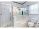Bathroom featuring a bathtub and glass enclosed shower area, plus a toilet at 137 Citation Dr, Mooresville, NC 28117