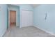Bedroom with neutral carpet, closet, and door to hallway at 137 Citation Dr, Mooresville, NC 28117