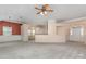 Bright and open living space with a ceiling fan and partial view of the entryway at 137 Citation Dr, Mooresville, NC 28117