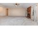 Large living room with neutral carpet and a cozy brick fireplace at 137 Citation Dr, Mooresville, NC 28117