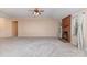 Spacious living area with neutral carpet and a traditional brick fireplace at 137 Citation Dr, Mooresville, NC 28117