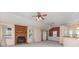 A spacious living room with large windows and a brick fireplace at 137 Citation Dr, Mooresville, NC 28117