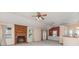 Bright living space featuring a brick fireplace and access to the backyard at 137 Citation Dr, Mooresville, NC 28117