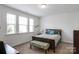 Bedroom with large windows providing ample natural light at 15018 Marymont Ave, Huntersville, NC 28078