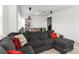 Relaxing Gathering room featuring a large sectional sofa, projector and game table, ideal for entertainment at 15018 Marymont Ave, Huntersville, NC 28078